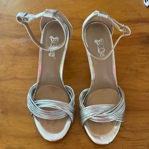 Silver sandals. Size 6. Worn once. 4” heel. Super cute. Great for weddings.